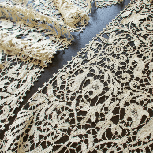 Woven laces and tapes designed for garment trims, labels, and decorative textile applications.