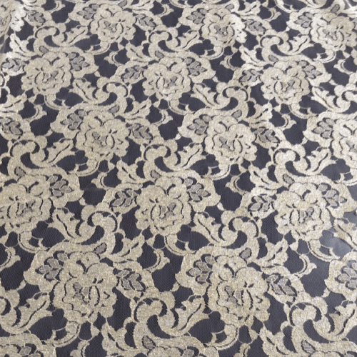 Raschel lace fabrics with intricate patterns, manufactured by Mehran Enterprise for lightweight, decorative textile and garment applications.